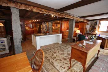 Granite and cherry countertops and cabinets